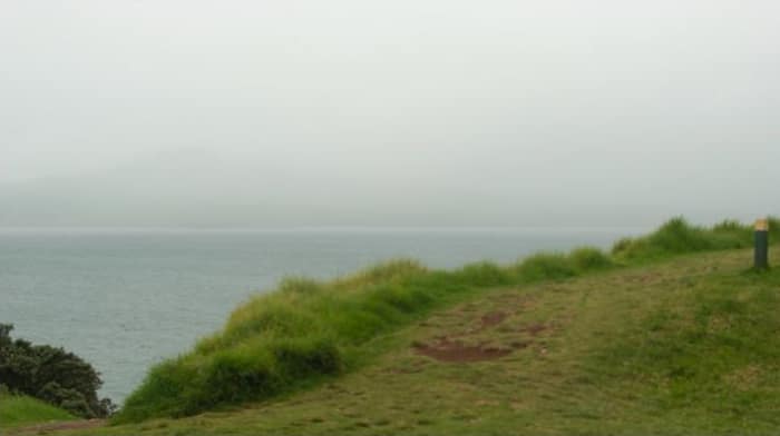 Distant fog over water